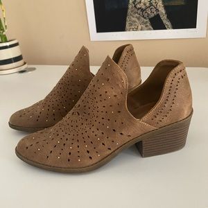 Unworn suede ankle booties with design